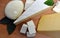 A set of different kinds of cheese - mozzarella, feta, brie, Dutch