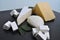 A set of different kinds of cheese - mozzarella, feta, brie, Dutch