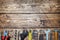 Set of different repair tools on wooden background with copy space