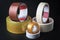 Set of different rolled adhesive tape at black background