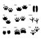 A set of different silhouettes of paws of animals. Vector illustration