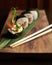 Set of different sushi and rolls wood desk top view nature food chopstick japan traditional fish tasty closeup