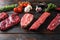 A set of different types of raw beef steaks alternative cut flap flank Steak, machete steak or skirt cut, Top blade or flat iron