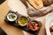 Set of dipping sauces hummus, guacamole, tomato tapenade