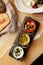 Set of dipping sauces hummus, guacamole, tomato tapenade