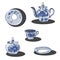 A set of dishes in the gzhel style with blue flowers. Porcelain and earthenware ceramic items for table setting. Teapot, sugar bow