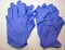 Set disposable blue medical gloves. Use in hospital or medical studies against coronavirus or other types of infections
