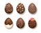 set of Easter chocolate eggs with decorative elements. Isolated design object on white background.