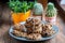 Set of easy to prepare and healthy, homemade oatmeal and blueberry cookies - on beautiful blue plate. Cookies are tied and