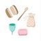 Set of ecological personal hygiene items - wooden toothbrush, menstrual cup, solid soap, brushes, cotton bag.