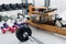 Set of equipment for weightlifting and fitness: dumbbells, barbell and rowing machine at gym
