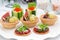 Set of festive Christmas mini appetizers, closeup