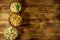 Set of festive mayonnaise salads on wooden table. Top view, copy space