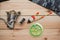 Set for fishing on the wooden background with camouflage clothing. Coil, colored floats, fishing line.