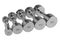 A set of five steel chrome dumbbells of different weights, stand in a row, on a white background