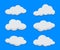 Set of flat cartoon clouds on blue background. Cloud templates for design. Fluffy vector clouds collection.