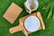 Set flatware style rustic have spoon, fork, empty plate and cup on green grass background