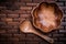 Set of flowershaped wood bowl and spoon on wooden matting