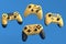 Set of flying gamer joysticks or gamepads on blue background