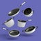 Set of flying stewpot, frying pan and chrome plated cookware on violet