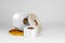 a set of four coils of silk ribbons in white, beige, orange in different sizes for labels or branding, isolated on a