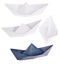 Set of four origami boats isolated on white