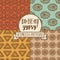 Set of four seamless patterns with ethnic or psychedelic symbols