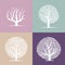 Set of four silhouettes of trees on colorful backgrounds