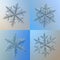 Set of four snowflakes on bright blue gradient background