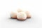 A set of four white mochi rice cakes. Round sweets on a white background. Created using generative AI