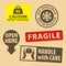 Set of fragile sticker handle with care and case icon packaging symbols sign, keep refrigerated, open here rubber stamp on cardboa