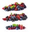 Set of fresh fruits and berries isolated a white background. Ripe blueberries, blackberries, currants, raspberries and strawberrie