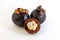 Set fruit mangosteen open with white succulent core solid fruit hard skin shell