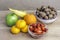 Set of fruits, tangerines, banana, apple, orange, walnuts