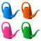 Set of garden plastic watering cans of different colors