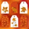 Set gift tags. Stock set for autumn sale. Abstract blurred orange background. Fall leafs. Text of percent discounts.