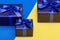 A set of gifts and surprises in blue boxes decorated with ribbons with bows