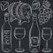 Set of glases and bottles for wine on blackboard