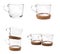 Set of glass mugs with cork stands isolated on white background - Image