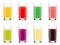 Set of glasses with juice from fruits of different colors