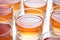 Set of glasses with kombucha tea or homemade lemonades on white background, close up. Organic kombucha drinks made of yeast, sugar