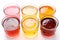 Set of glasses with kombucha tea or homemade lemonades on white background, close up. Unfiltered kombucha drinks made of yeast,