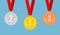 Set of gold, bronze and silver medals on red ribbons.