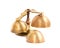 Set of gold handbells on white background