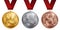 A set of gold, silver and bronze medals, the first, second and third place. Winner, champion, number one, two, three. Red ribbon.
