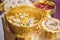 A set of the golden water bowl for holy water in the Thai wedding ceremony and the flower trays decoration
