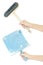 Set of hand holding construction bucket trowel and brush isolated