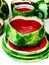 a set of handmade decorative crockery in green - red color like a real watermelon