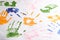 Set of handprints of children left with colorful paints on a white background, children`s creativity