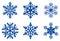 Set of ice blue Frosty snowflakes on an isolated white background.